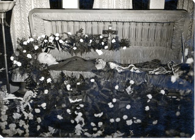 John W. Kleinhenz, deceased, in a casket at the Castle house at 518 West Jackson Street in St Marys, Ohio. December 27, 1944. John W. Kleinhenz is my maternal great-grandfather.